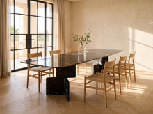 Alpi Sculptural Marble Dining Table
